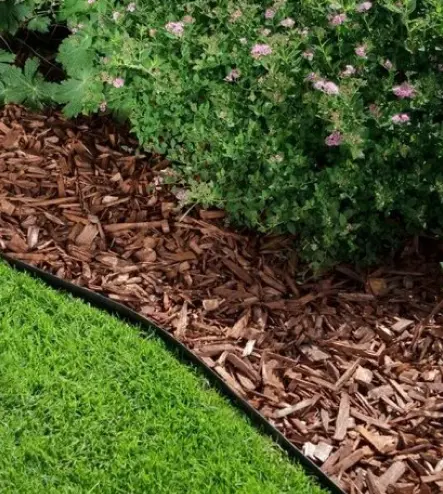 love-your-neighbor-as-yourself-laying-mulch